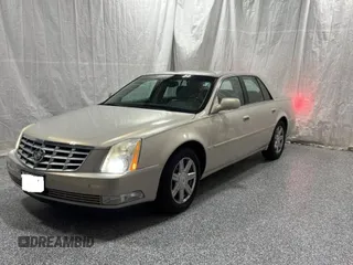 2007 Cadillac DTS V8 z VIN 1G6KD57Y27U198589, wystawiony jako Copart lot #59233755 z przebiegiem 171 023 mil mil oraz Tytuł czysty. Historia ofert i sprzedaży dostępna na DreamBid. Obrazek 2.