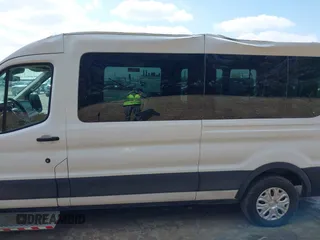 2021 Ford Transit Cargo with VIN 1FTBR1C85MKA66513, listed as a IAAI auction lot 42016528 with 18,174 mi miles and . Bid and sale history available at DreamBid. Image 14.