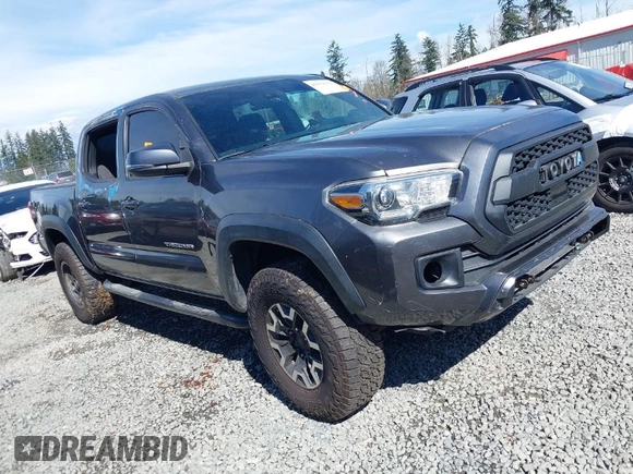 2019 Toyota Tacoma SR z VIN 3TMCZ5AN9KM232882, wystawiony jako IAAI lot #41879314 z przebiegiem Nie podano mil oraz . Historia ofert i sprzedaży dostępna na DreamBid. Obrazek 1.