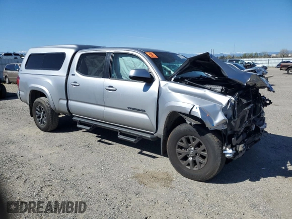 2021 Toyota Tacoma SR5 with VIN 3TMDZ5BN0MM103256, listed as a Copart auction lot 50101675 with 49,673 mi miles and Salvage title. Bid and sale history available at DreamBid. Image 4.