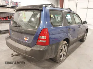 2003 Subaru Forester X with VIN JF1SG63663H708501, listed as a IAAI auction lot 41547662 with 208,134 mi miles. Bid and sale history available at carsss.com. Image 4.
