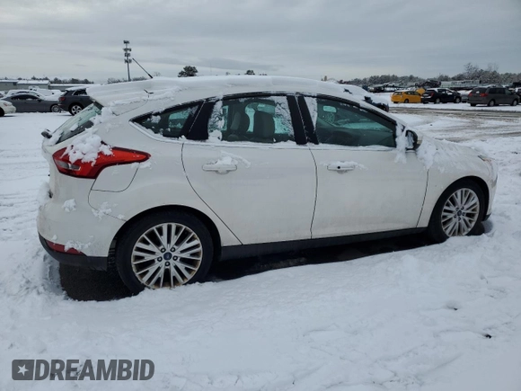 2016 Ford Focus Titanium с VIN 1FADP3N21GL312173, выставлен на аукционе Copart как лот 45011755 с пробегом 87 099 миль миль и На запчасти • Non repairable. История ставок и продаж доступна на DreamBid. Изображение 3.