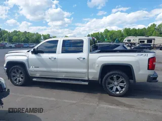 2014 GMC Sierra 1500 SLT with VIN 3GTU2VEC5EG548784, listed as a IAAI auction lot 42156738 with 118,809 mi miles and . Bid and sale history available at DreamBid. Image 14.