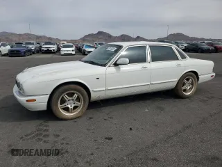 1999 Jaguar XJ with VIN SAJHX1048XC861105, listed as a Copart auction lot 50108225 with Not provided miles and Clean title. Bid and sale history available at DreamBid. Image 1.