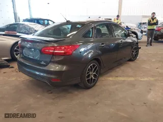 2016 Ford Focus SE with VIN 1FADP3F25GL308870, listed as a IAAI auction lot 41690326 with 103,136 mi miles. Bid and sale history available at carsss.com. Image 4.