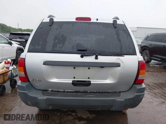 2004 Jeep Grand Cherokee Laredo z VIN 1J4GW48S64C132172, wystawiony jako IAAI lot #42163524 z przebiegiem 170 952 mil mil oraz . Historia ofert i sprzedaży dostępna na DreamBid. Obrazek 16.