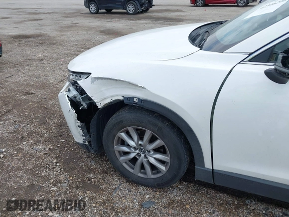 2016 Mazda CX-9 Sport with VIN JM3TCABY4G0100620, listed as a IAAI auction lot 42316216 with 191,245 mi miles and . Bid and sale history available at DreamBid. Image 6.