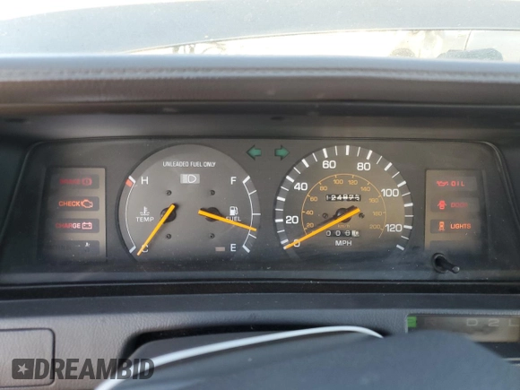 1989 Toyota Camry z VIN JT2SV21E8K0314703, wystawiony jako Copart lot #76053194 z przebiegiem 124 873 mil mil oraz Nie do naprawy • Non repairable. Historia ofert i sprzedaży dostępna na DreamBid. Obrazek 9.