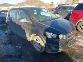 2013 Chevrolet Sonic LT with VIN 1G1JC6SB2D4256838, listed as a IAAI auction lot 41443769 with 98,839 mi miles. Bid and sale history available at carsss.com. Image 1.