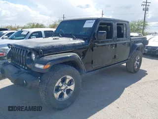 2021 Jeep Gladiator Willys with VIN 1C6HJTAG7ML523718, listed as a IAAI auction lot 42206058 with 48,071 mi miles and . Bid and sale history available at DreamBid. Image 17.
