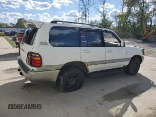 1999 Toyota Land Cruiser with VIN JT3HT05J3X0068111, listed as a Copart auction lot 72815044 with 185,043 mi miles and Clean Title. Bid and sale history available at carsss.com. Image 3.