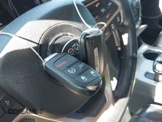 2015 Jeep Grand Cherokee Summit with VIN 1C4RJFJGXFC125131, listed as a IAAI auction lot 42475017 with 128,166 mi miles and . Bid and sale history available at DreamBid. Image 11.