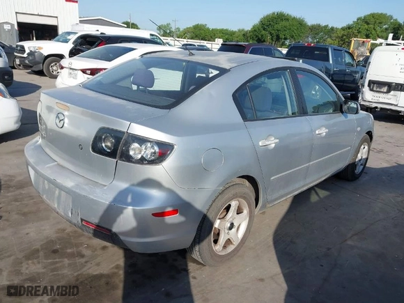 2007 Mazda Mazda3 i Sport with VIN JM1BK12F071721580, listed as a IAAI auction lot 42018938 with 141,801 mi miles. Bid and sale history available at carsss.com. Image 4.