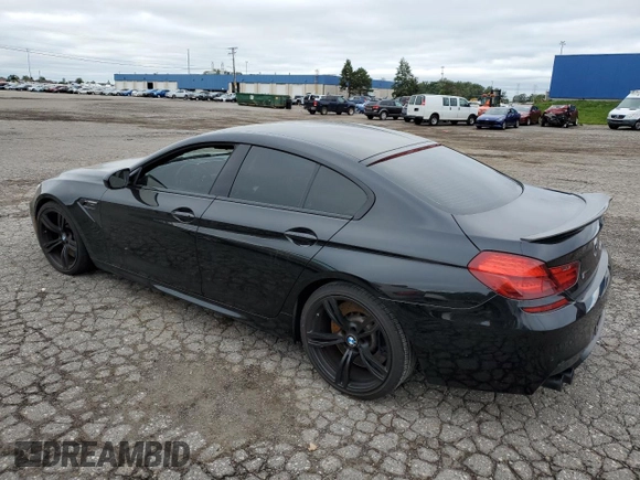 2015 BMW M6 z VIN WBS6C9C59FD467652, wystawiony jako Copart lot #66093293 z przebiegiem Nie podano mil oraz . Historia ofert i sprzedaży dostępna na DreamBid. Obrazek 2.