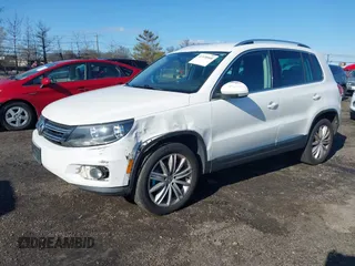 2013 Volkswagen Tiguan SE with VIN WVGBV7AX7DW511699, listed as a IAAI auction lot 41970908 with 164,758 mi miles and . Bid and sale history available at DreamBid. Image 2.