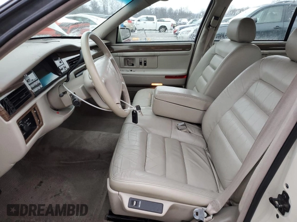 1995 Cadillac DeVille z VIN 1G6KD52B8SU274053, wystawiony jako Copart lot #86429934 z przebiegiem 100 496 mil mil oraz Szkoda całkowita • Salvage title. Historia ofert i sprzedaży dostępna na DreamBid. Obrazek 7.