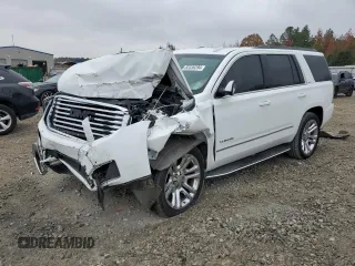 2019 GMC Yukon SLT with VIN 1GKS2BKC2KR338007, listed as a Copart auction lot 82336394 with 105,087 mi miles and Salvage Title. Bid and sale history available at carsss.com. Image 1.