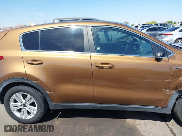 2017 Kia Sportage LX z VIN KNDPMCAC5H7121297, wystawiony jako IAAI lot #42088915 z przebiegiem 91 374 mil mil oraz . Historia ofert i sprzedaży dostępna na DreamBid. Obrazek 13.