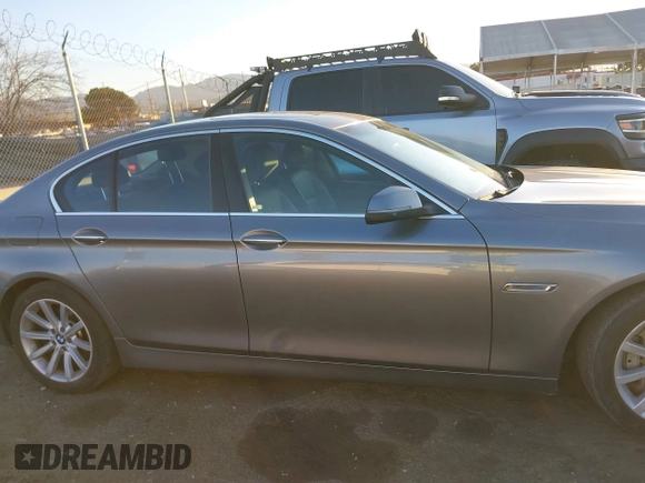 2014 BMW 5 Series 535i with VIN WBA5B1C54ED479873, listed as a IAAI auction lot 41338061 with 75,097 mi miles and . Bid and sale history available at DreamBid. Image 13.