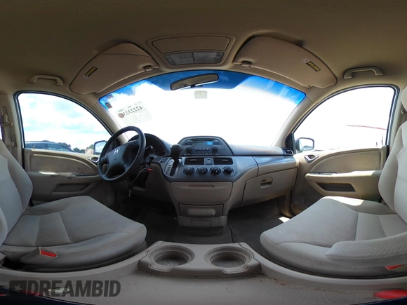 2007 Honda Odyssey LX with VIN 5FNRL382X7B135892, listed as a IAAI auction lot 42223231 with 204,054 mi miles and . Bid and sale history available at DreamBid. Image 21.