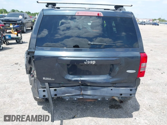 2014 Jeep Patriot Latitude with VIN 1C4NJPFA4ED604145, listed as a IAAI auction lot 42091619 with 81,119 mi miles and . Bid and sale history available at carsss.com. Image 6.