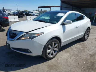2012 Acura ZDX Tech Pkg with VIN 2HNYB1H42CH500312, listed as a IAAI auction lot 41841597 with 166,879 mi miles. Bid and sale history available at carsss.com. Image 2.