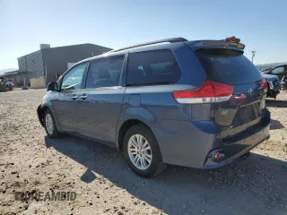 2014 Toyota Sienna XLE with VIN 5TDYK3DC5ES467244, listed as a Copart auction lot 54777445 with 157,503 mi miles and Salvage Title. Bid and sale history available at DreamBid. Image 2.