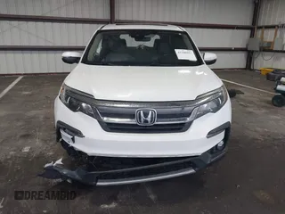 2021 Honda Pilot EX-L with VIN 5FNYF5H57MB022843, listed as a IAAI auction lot 41186957 with 57,836 mi miles. Bid and sale history available at carsss.com. Image 12.