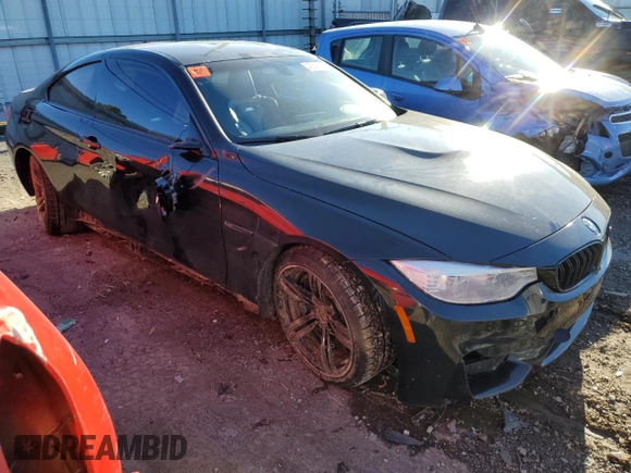 2015 BMW M4 with VIN WBS3R9C54FK334438, listed as a Copart auction lot 40663324 with 0 mi miles. Bid and sale history available at carsss.com. Image 4.