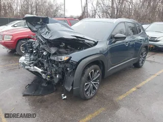 2024 Mazda CX-50 2.5 Turbo with VIN 7MMVABXY6RN156599, listed as a IAAI auction lot 41162244 with 10,042 mi miles. Bid and sale history available at carsss.com. Image 2.