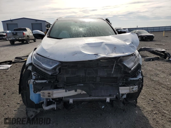 2021 Honda CR-V Touring z VIN 2HKRW2H92MH661297, wystawiony jako Copart lot #55984455 z przebiegiem 23 437 mil mil oraz Szkoda całkowita • Salvage title. Historia ofert i sprzedaży dostępna na DreamBid. Obrazek 5.