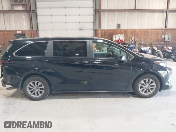2023 Toyota Sienna XLE z VIN 5TDYRKEC5PS148076, wystawiony jako IAAI lot #42154673 z przebiegiem 169 197 mil mil oraz . Historia ofert i sprzedaży dostępna na DreamBid. Obrazek 13.