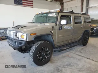 2003 Hummer H2 with VIN 5GRGN23U73H142618, listed as a Copart auction lot 89116505 with 28,597 mi miles and Salvage Title. Bid and sale history available at carsss.com. Image 1.