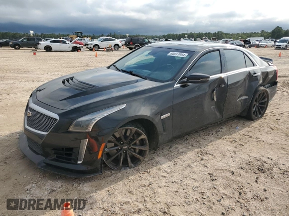 2018 Cadillac CTS-V z VIN 1G6A15S61J0132091, wystawiony jako Copart lot #64077954 z przebiegiem 60 874 mil mil oraz Tytuł czysty. Historia ofert i sprzedaży dostępna na DreamBid. Obrazek 1.