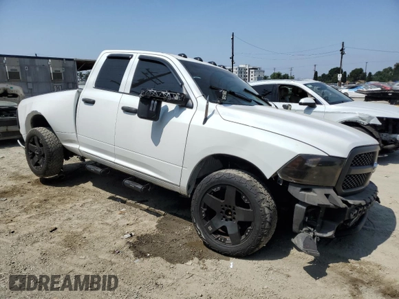 2014 Ram 1500 Express with VIN 1C6RR7FT9ES177804, listed as a Copart auction lot 61002585 with 213,442 mi miles and Salvage title. Bid and sale history available at DreamBid. Image 4.