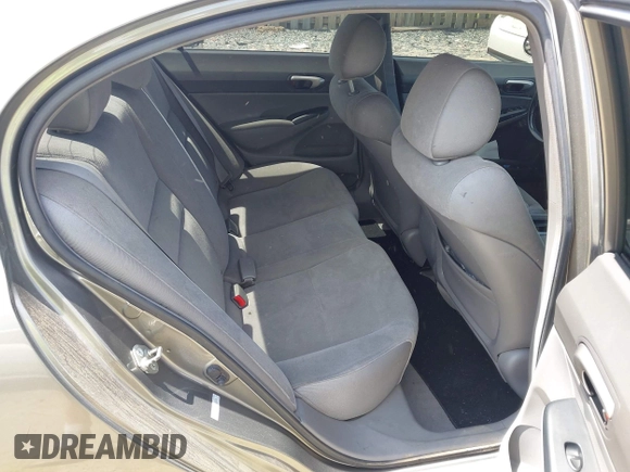 2006 Honda Civic LX with VIN 1HGFA16586L104230, listed as a IAAI auction lot 42215822 with 128,704 mi miles and . Bid and sale history available at DreamBid. Image 8.