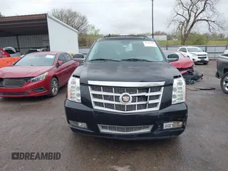 2014 Cadillac Escalade Platinum z VIN 1GYS4DEF9ER212880, wystawiony jako IAAI lot #41954880 z przebiegiem 193 203 mil mil oraz . Historia ofert i sprzedaży dostępna na DreamBid. Obrazek 12.