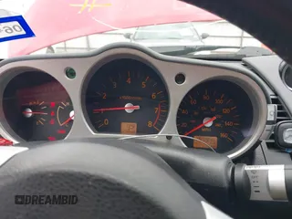 2005 Nissan 350Z Enthusiast z VIN JN1AZ34D15M608038, wystawiony jako IAAI lot #42312878 z przebiegiem 189 946 mil mil oraz . Historia ofert i sprzedaży dostępna na DreamBid. Obrazek 7.