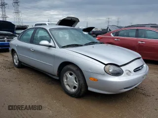 1999 Ford Taurus SE with VIN 1FAFP53U2XA134648, listed as a Copart auction lot 54305325 with 56,794 mi miles and Clean title. Bid and sale history available at DreamBid. Image 4.