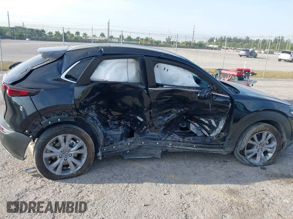 2024 Mazda CX-30 S Preferred with VIN 3MVDMBCM0RM669099, listed as a IAAI auction lot 41864473 with 6,278 mi miles and . Bid and sale history available at DreamBid. Image 6.