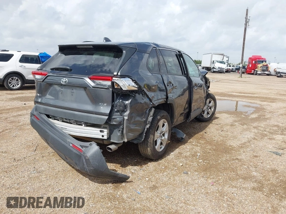 2021 Toyota RAV4 XLE with VIN 2T3W1RFV5MC104078, listed as a IAAI auction lot 42591343 with 57,057 mi miles and . Bid and sale history available at DreamBid. Image 4.