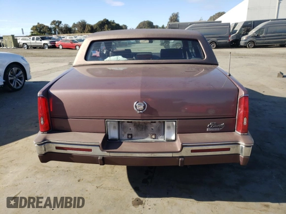 1988 Cadillac Eldorado with VIN 1G6EL1153JU632470, listed as a Copart auction lot 78507684 with 176,894 mi miles and Salvage Title. Bid and sale history available at DreamBid. Image 6.