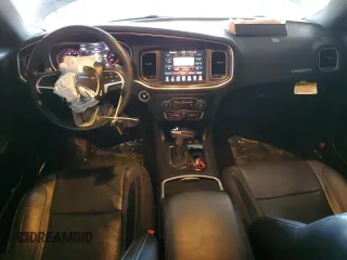 2015 Dodge Charger SXT with VIN 2C3CDXJG9FH748809, listed as a Copart auction lot 61682335 with 128,252 mi miles and Salvage title. Bid and sale history available at DreamBid. Image 8.