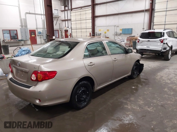 2009 Toyota Corolla with VIN 1NXBU40E19Z014460, listed as a IAAI auction lot 41973023 with 74,927 mi miles. Bid and sale history available at carsss.com. Image 4.
