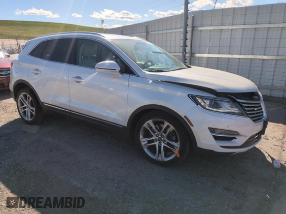 2015 Lincoln MKC z VIN 5LMTJ2AH7FUJ26375, wystawiony jako Copart lot #57830425 z przebiegiem 96 169 mil mil oraz Szkoda całkowita • Salvage title. Historia ofert i sprzedaży dostępna na DreamBid. Obrazek 4.