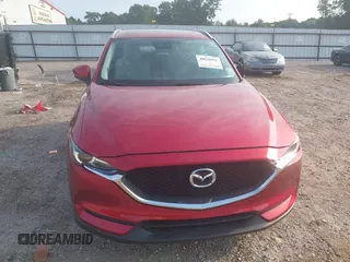 2017 Mazda CX-5 Grand Touring with VIN JM3KFADL8H0189033, listed as a IAAI auction lot 40029931 with 88,933 mi miles and . Bid and sale history available at carsss.com. Image 13.