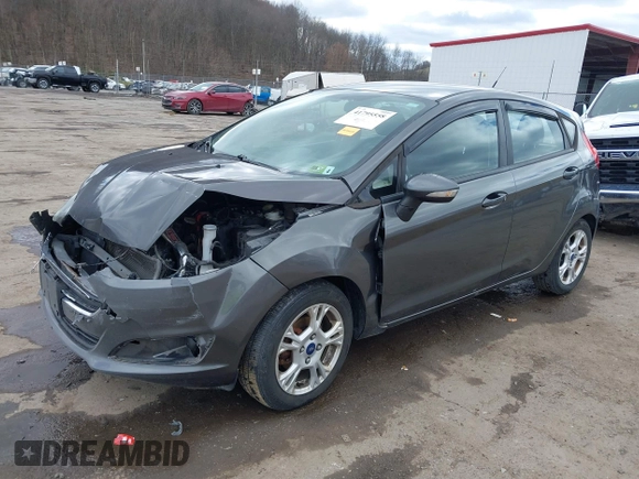 2015 Ford Fiesta SE with VIN 3FADP4EJ0FM117739, listed as a IAAI auction lot 41795558 with 111,000 mi miles. Bid and sale history available at carsss.com. Image 17.
