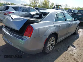 2016 Chrysler 300 Anniversary Edition with VIN 2C3CCAAG4GH238255, listed as a IAAI auction lot 42163236 with 253,452 mi miles and . Bid and sale history available at DreamBid. Image 4.
