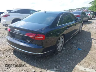 2015 Audi A8 4.0T with VIN WAU32AFD3FN039603, listed as a IAAI auction lot 42267467 with 120,393 mi miles and . Bid and sale history available at DreamBid. Image 4.