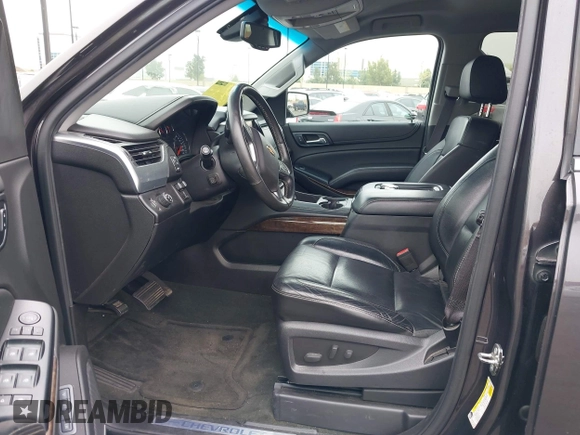 2015 Chevrolet Tahoe LT with VIN 1GNSCBKC1FR233898, listed as a IAAI auction lot 42004048 with 115,779 mi miles and . Bid and sale history available at DreamBid. Image 5.